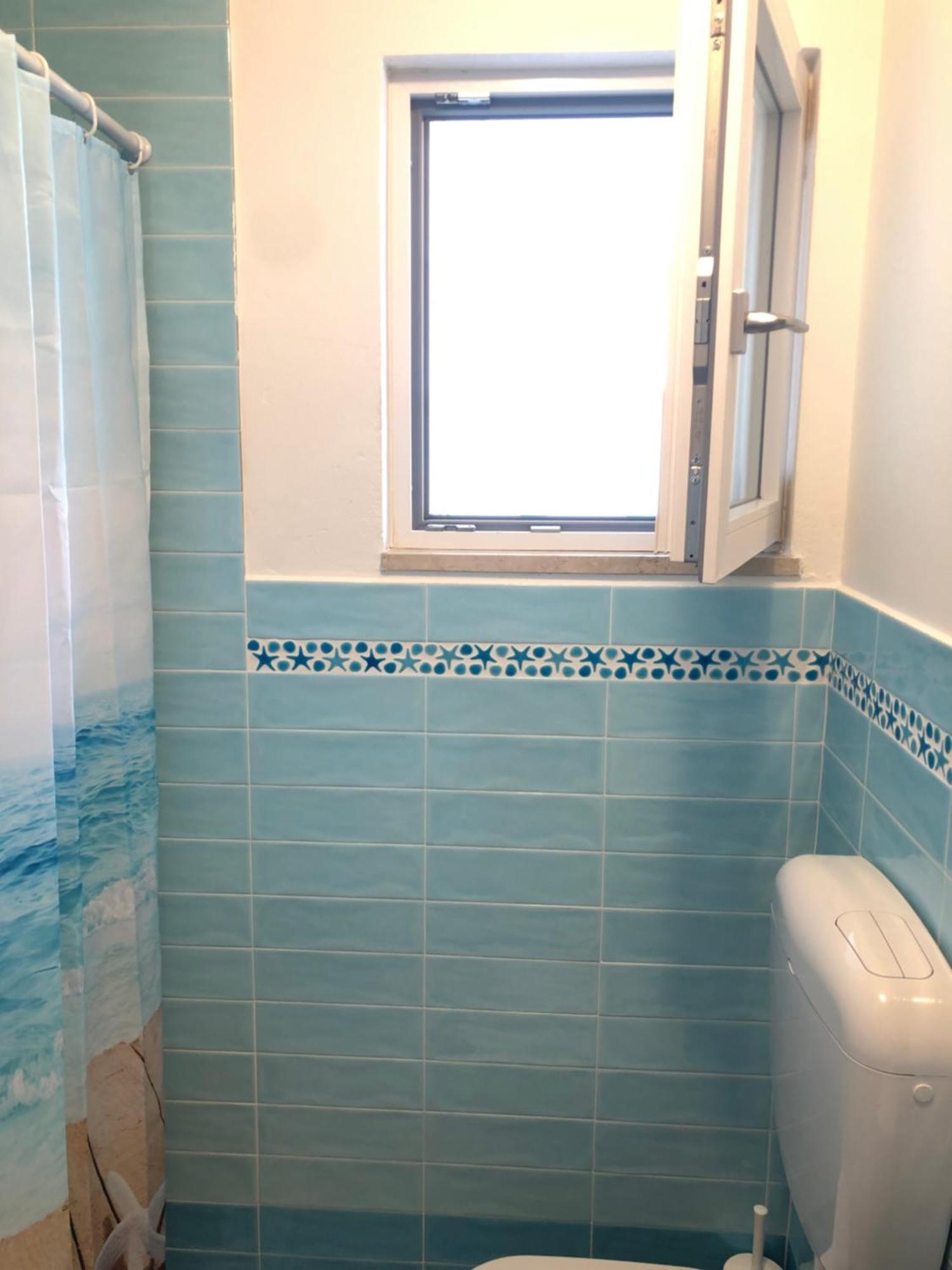 Giulio's - Beachfront Apartamento